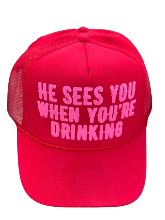 Holiday Trucker Hat HE SEES YOU WHEN YOU'ER DRINKING